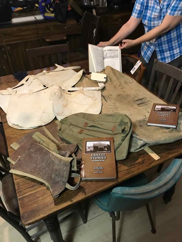 lot 90 image: Bedroom 1  Vintage Baseball Clothing, Canvas Duffle Bag and Deike Book from Hye, Tx.