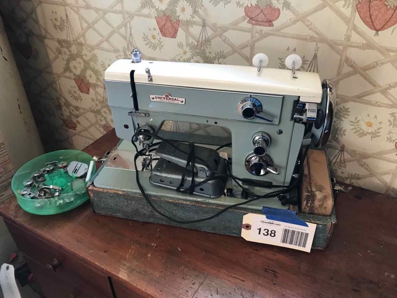 lot 138 image: Laundry Room Universal Sewing Machine (blue) with Attachments