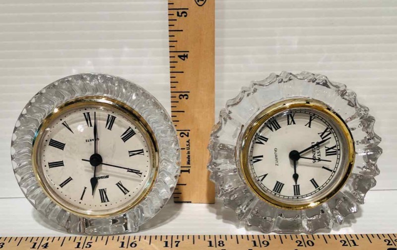lot 26 image: (2) GlassCrystal Clocks, Round Faces Crystal Legends by Godinger, Quartz (LR)