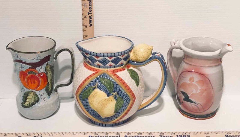 lot 83 image: (3) Pitchers  Salado Pottery, Lemons, Red Pepper (LR)