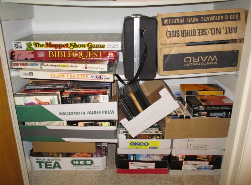 lot 296 image: Closet of Games, VHS Tapes and DVDs (H)