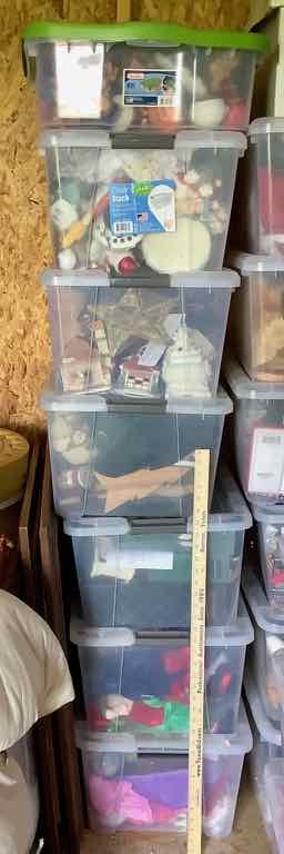 lot 555 image: Stack of Totes with Holiday Decorations (SH)
