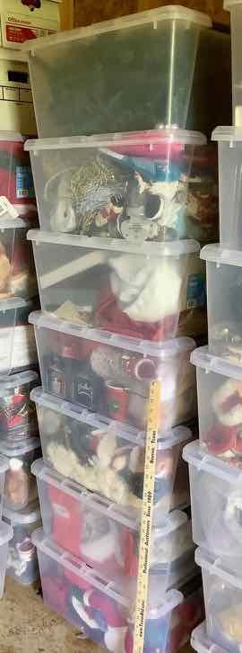 lot 557 image: Stack of Totes with Holiday Decorations (SH)