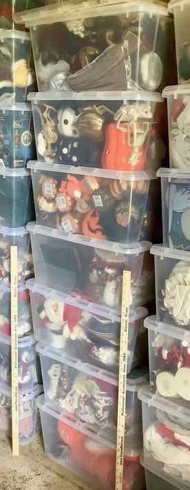 lot 559 image: Stack of Totes with Holiday Decorations (SH)