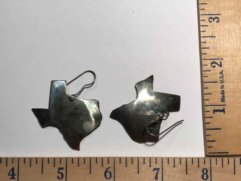 lot 916 image: Jewelry  (1) Pair of Texas Shaped Earrings, Pierced