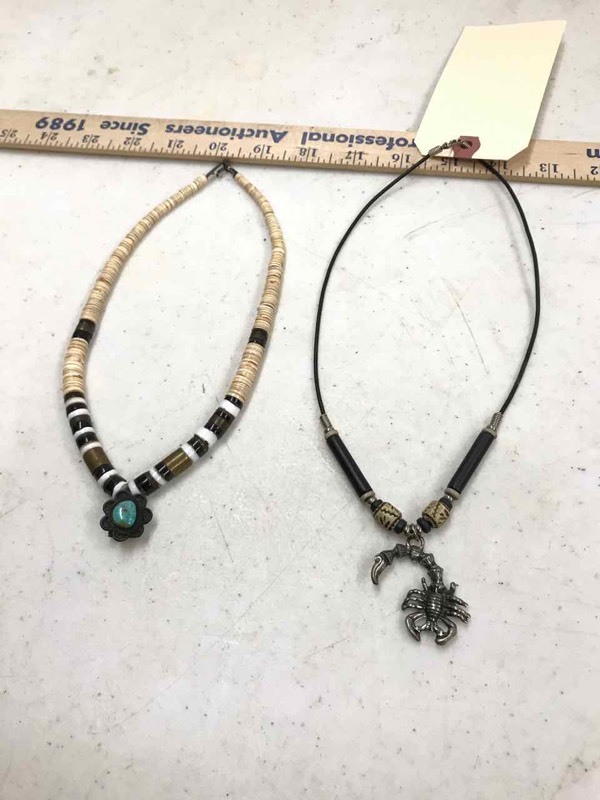 lot 110 image: (2) Necklaces Pooka Shell & Turquoise and a Black Cord with Scorpion