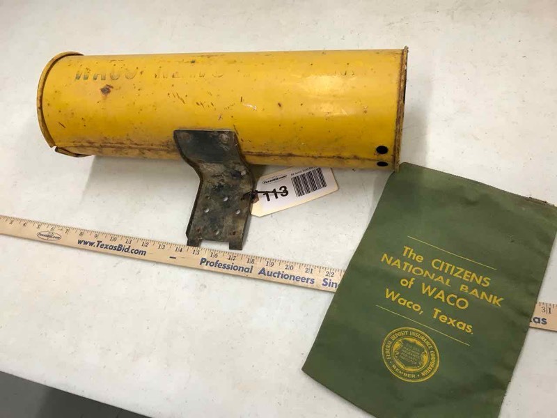 lot 113 image: Waco Times Herald Yellow Tin Newspaper Holder & Waco Bank Bag