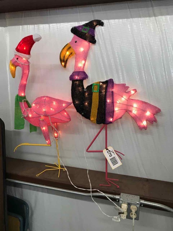 lot 270 image: (2) Yard Art Flamingo  Witchy, Christmas Hat