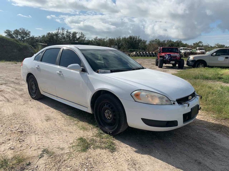 lot 404 image: 2013 Chevrolet Impala Police Vehicle, 4dr, white, odo 115,473, see video  (VIN  2G1WD5E37D1237702)