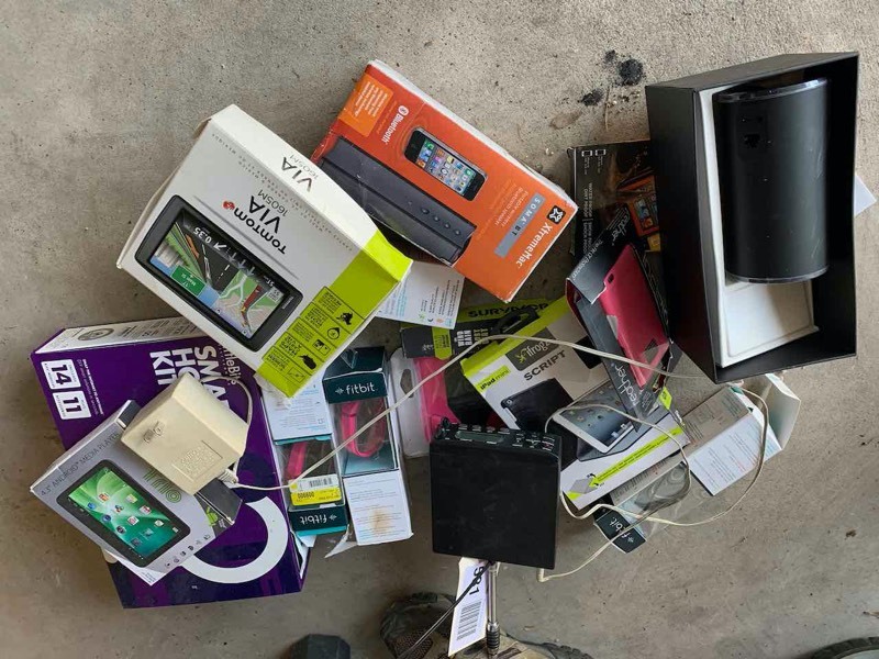 lot 531 image: Asset Forfeiture  Assorted Electronics  Fit Bits, Android Media Player, BT Speaker, Phone Cases, Uniden Bearcat Scanner BC-350A, Tom Tom GPS