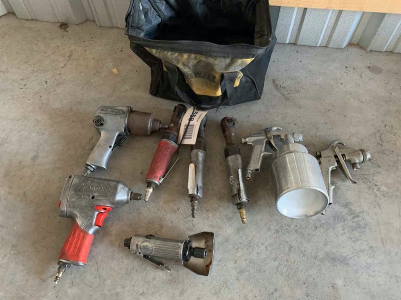 lot 558 image: Asset Forfeiture  Dewalt Bag with Blue Point Impact, Husky Impact, Husky 38 Air Ratchet, Binks Spray Head, Cut Off Tool, Plus More