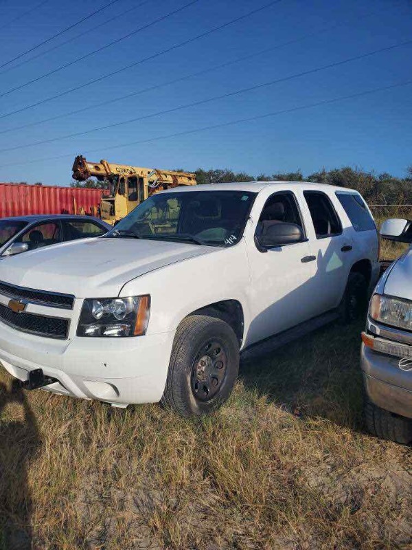 lot 414 image: 2012 Chevrolet Tahoe Police Vehicle, white, doesnt run, unk. cond,  mileage 76,324  (VIN  1GNLC2E08CR195748)