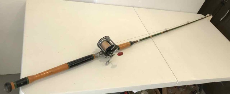 1) Vintage Fishing Rod with Reel: South Bend Sea Master 6 ft with