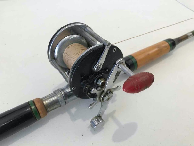 1) Vintage Fishing Rod with Reel: South Bend Sea Master 6 ft with