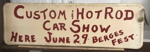 lot 503 image: Old Painted Sign Custom & Hot Rod Show BergesFest and a wooden token