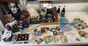 lot 539 image: Elvis Presley Buttons, Tins, Stamps, Lighter, Key Ring, Pocket Knives, Christmas Ornaments, Etc.