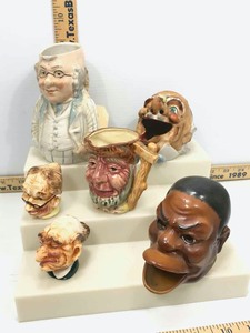 lot 556 image: Faces Creamer, (2) Ashtrays, Salt & Pepper, Toby Mug