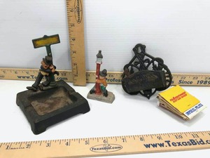 lot 557 image: Drunk Man on Streetlight Post Antique Wilton Cast Iron Ash Tray, Porcelain Figurine, Wilton Cast Iron Match Holder