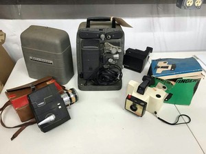 lot 560 image: Vintage Bell & Howell  Camera & Projector and (2) Polaroid Cameras