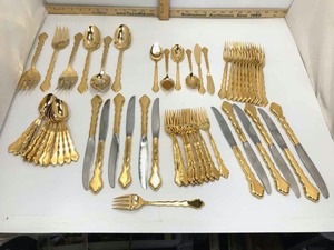 lot 601 image: Flatware Community Oneida (gold in color)