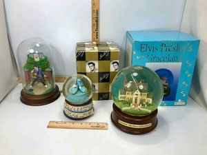 lot 604 image: Elvis Presley  (3) Musical Water Globe & Music Boxes