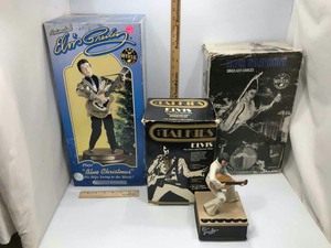 lot 606 image: Elvis Presley  (2) Figurines, telephone