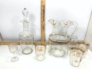 lot 672 image: Antique Painted Glassware  Decanter, Wine Glass, (4) Cups & Pitcher