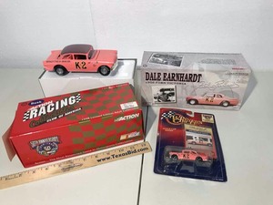 lot 680 image: Dale Earnhardt, Pink 124 Action 1956 Ford Victoria Coin Bank, Winners Circle Small Car (Pink)