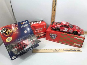 lot 681 image: Dale Earnhardt Action Coca Cola Racing Family 124 Scale Die Cast Car Coin Bank, Winners Circle Pit Row Series Crew Figure