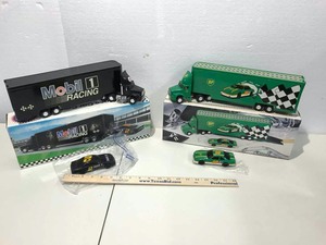 lot 686 image: (2) Racing Transport Trucks, Mobil 1 & BP (battery powered)