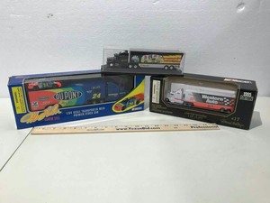 lot 690 image: (3) Car Haulers Western Auto, Mac Tools, Dupont