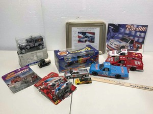lot 695 image: Autographed Driver Post Qualifying Party Invitation, Signed by David Starr, to Irvin & Patsy.  Assorted Die Cast Racing Trucks, Other Trucks, Etc.