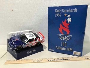 lot 696 image: Dale Earnhardt Limited Edition 124 Scale Stock Car on Bank Base, Winston Cup Collections
