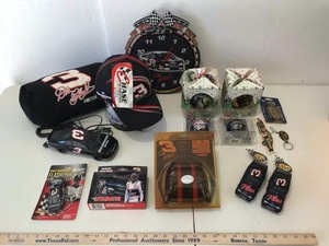 lot 744 image: Dale Earnhardt Collectibles Clock, Tin, Ornaments, Old Phone, Hearing Protection, Etc.