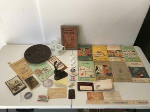 lot 749 image: Old Boerne Things Water Main Cast Iron Cover, Phone Books, Mugs, Stamp, Ads, Etc.