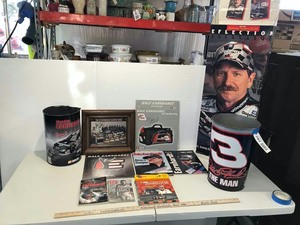 lot 793 image: Dale Earnhardt Books, Old Calenders, Waste Cans, Marketing Box for Posters, Etc.