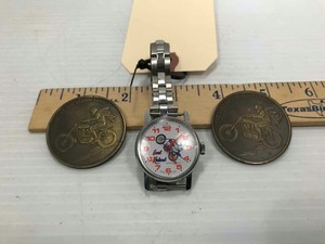 lot 910 image: Evel Knievel (1) Wrist Watch, (2) Tokens