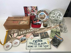 lot 949 image: Indianapolis 500 Drinking Glasses, Pennant, Plates, Cards, Books, Etc.