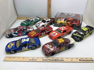 lot 970 image: (9) Assorted Die Cast (1) Coin Bank Texaco Haveline 28, (8) Cars