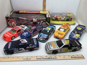 lot 973 image: Assorted Die Cast (6) Cars, (2) Coin Bank, (1) Car Hauler