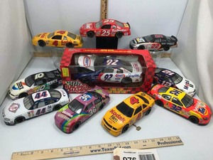 lot 976 image: (10) Assorted Die Cast (1) Coin Bank, (9) Cars