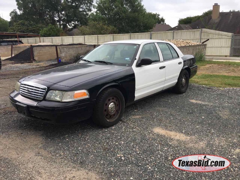 lot 11 image: Police Vehicle  2010 Ford Crown Victoria Police Interceptor,  odometer reads 125,150  (vin  2FABP7BV7AX119193)