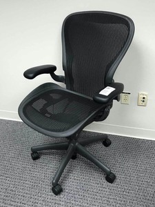 lot 56 image: Herman Miller Classic Aeron Task Chair Standard Tilt - Fixed Vinyl Arms - Standard Carpet Casters - AE211PWCN2G1BBBK3D19