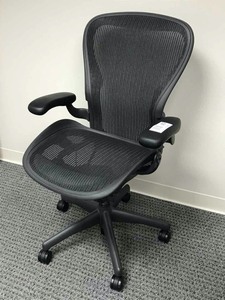 lot 57 image: Herman Miller Classic Aeron Task Chair Standard Tilt - Fixed Vinyl Arms - Standard Carpet Casters - AE211PWCN2G1BBBK3D20