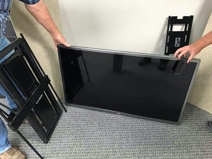 lot 64 image: LG Wall Mounted TV wremote, 47 in.  LED, Mod. 47GA6400