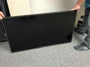 lot 65 image: LG Wall Mounted TV wremote, 49 in. No remote, LED, Mod. 49UJ6300