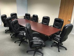 lot 84 image: Conference Room Furniture  Conference Table, 10 chairs and Credenza
