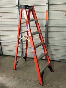 lot 9 image: Werner 6 Ft. Folding Step Ladder, 300# Rating
