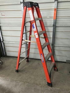 lot 10 image: Werner 6 Ft. Folding Step Ladder, 300# Rating