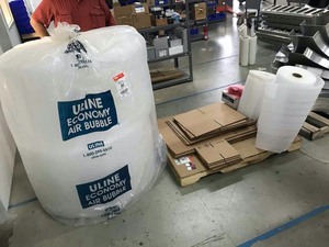 lot 266 image: Large roll bubble wrap and packing supplies, boxes